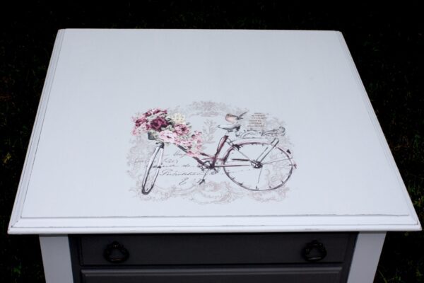 2 drawer light and dark gray end table with bicycle accent